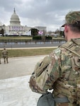 A Virginia National Guard Soldier assigned to Alpha Company, 229th Brigade Engineer Battalion, 116th Infantry Brigade Combat Team, stands guard at the Capitol during the 59th presidential inauguration Jan. 20, 2021, in Washington. About 1,000 Virginia Guard members are remaining in the nation's capital to assist local and federal authorities.