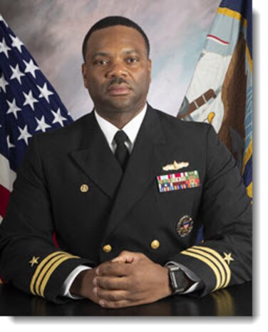 Studio portrait of Cmdr. Ray Glenn