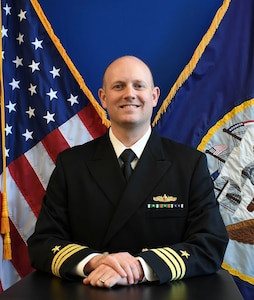 Studio portrait of Cmdr. Timothy Battles