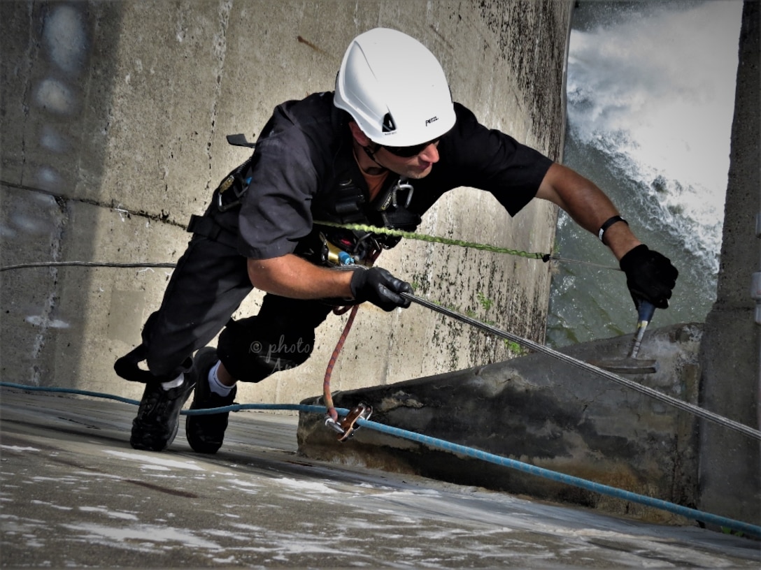 USACE Philadelphia District Structural Engineer Adrian Kollias conducts a bridge inspection at the Mahoning Creek Lake in New Bethlehem, PA in July 2020.