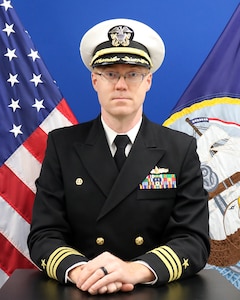 Studio portrait of Cmdr. Matt Krull