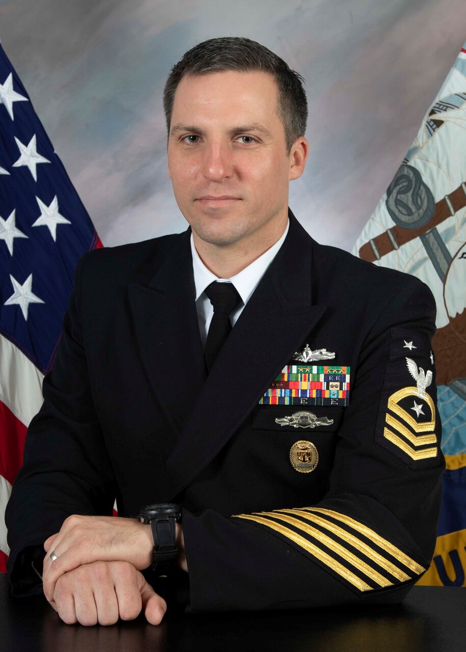 Studio portrait of CMDCM Clayton Alek-Finkelman