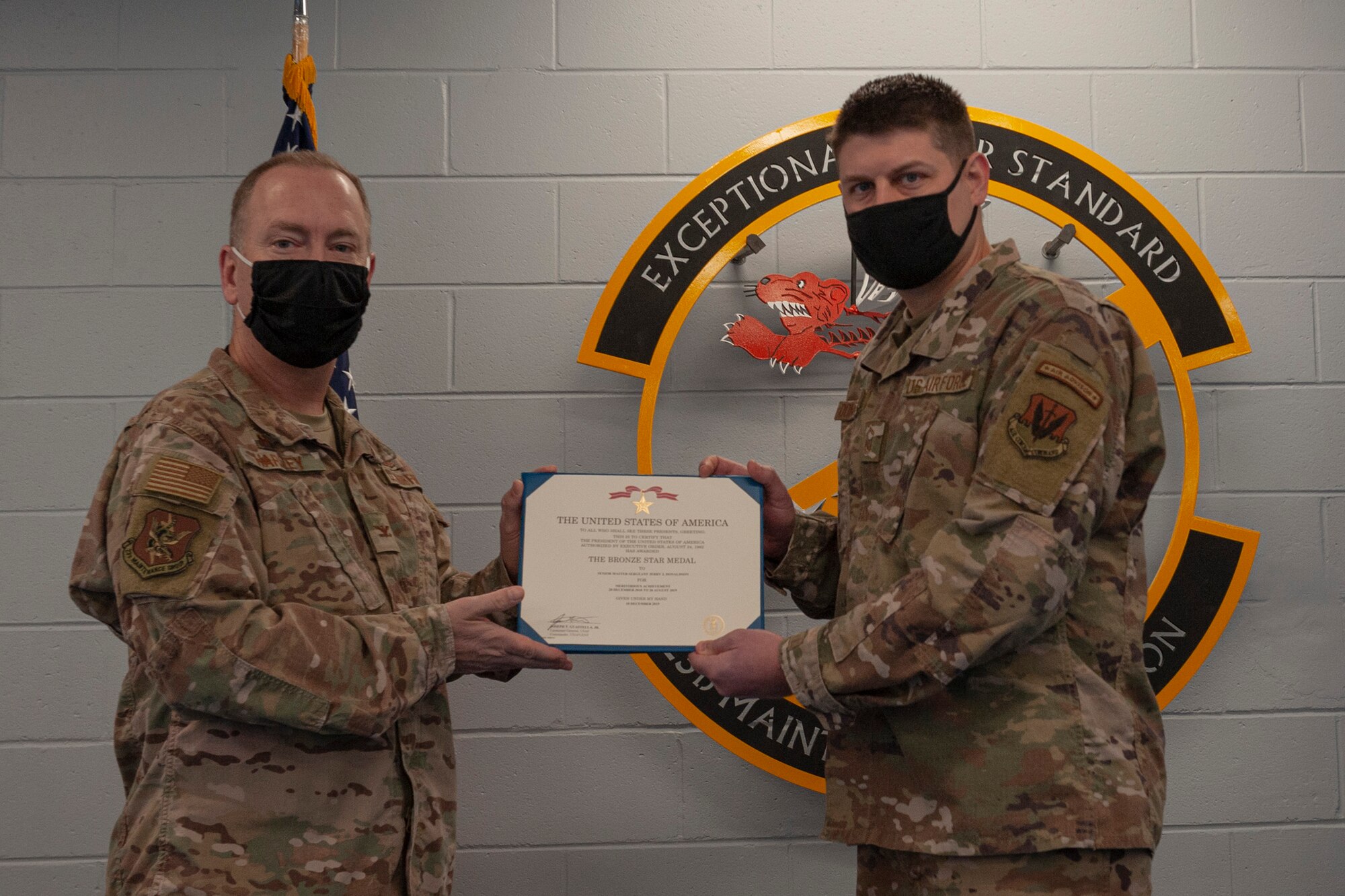 Photo of an Airman receiving a Bronze Star Medal