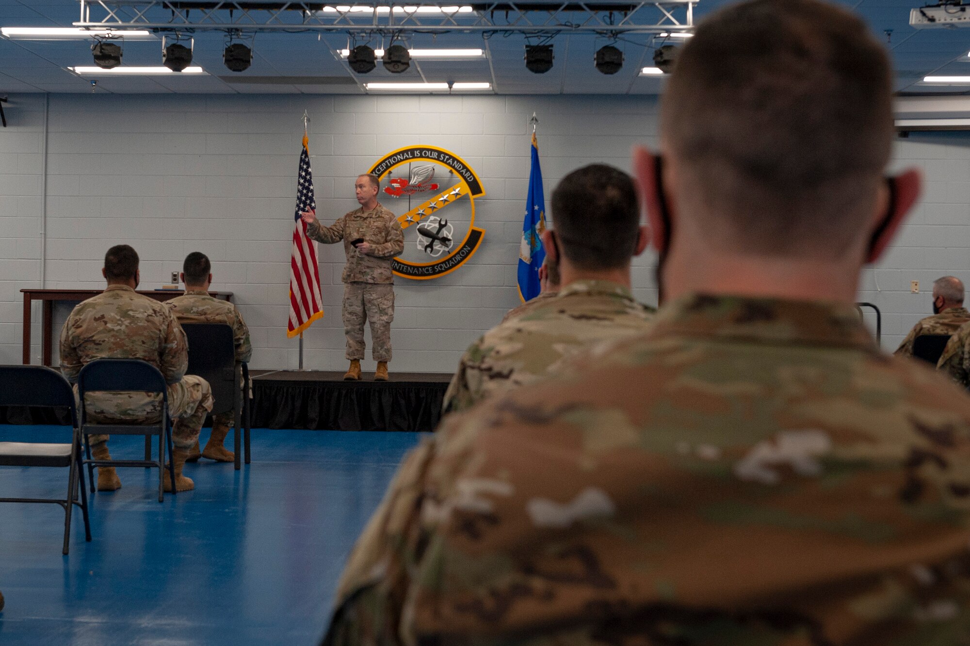 Photo of an Airman making remarks