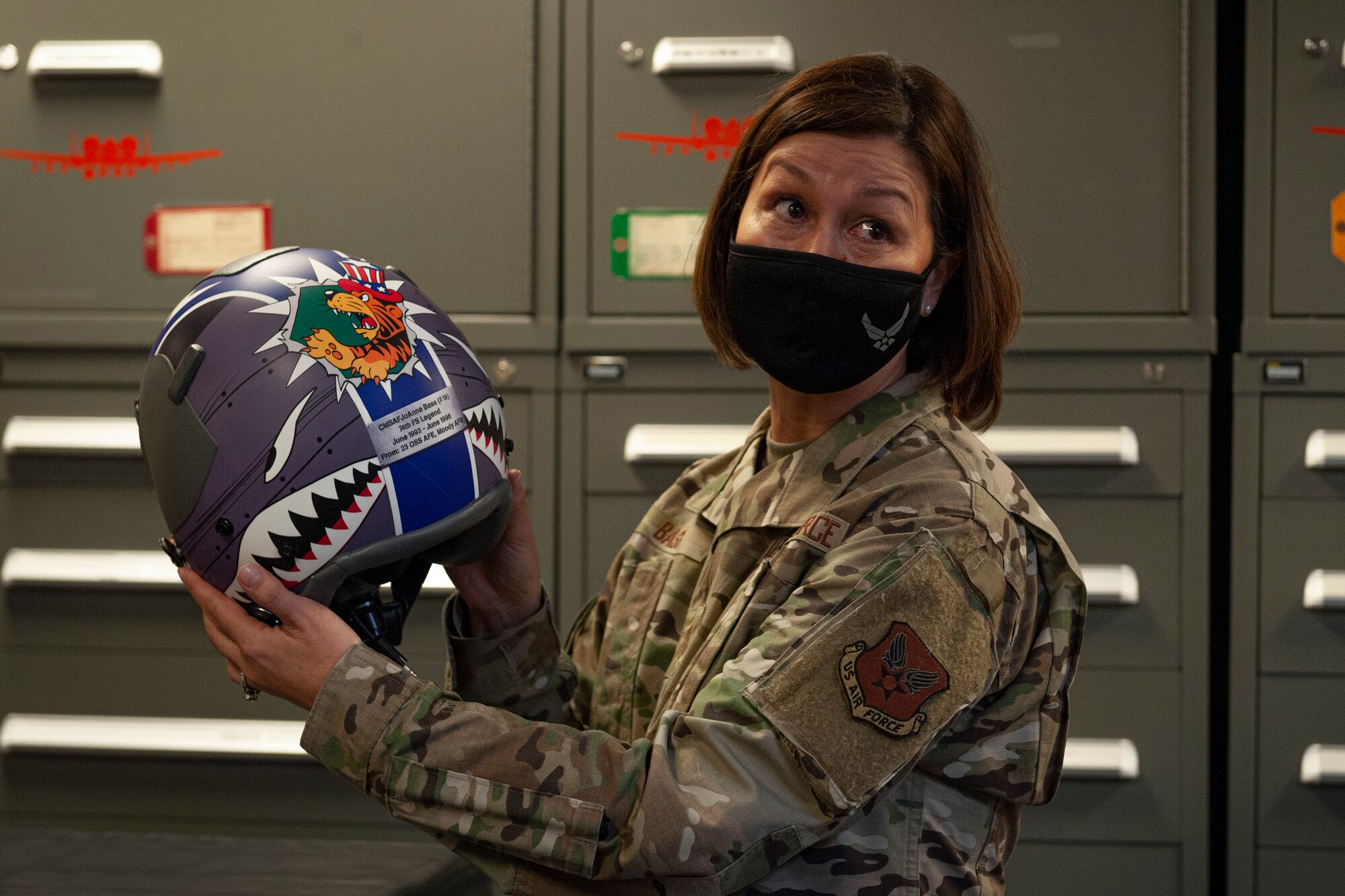 Photo of Chief Bass receiving a helmet