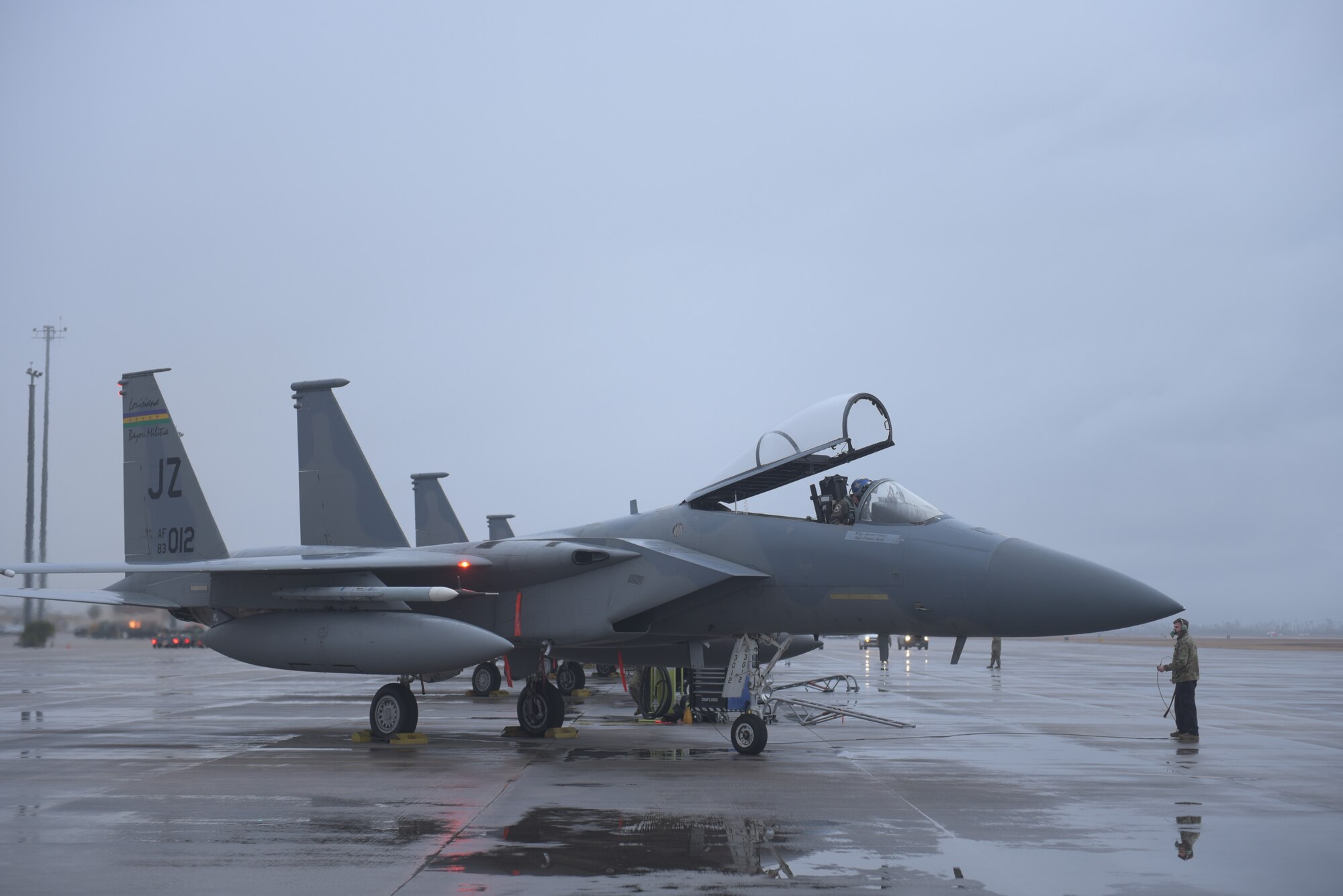 A U.S. Air Force F-15C Eagle pilot and crew chief assigned to the 159th Fighter Wing, Louisiana Air National Guard, conduct pre-flight operational and safety checks for the aircraft at Tyndall Air Force Base, Florida, Jan. 22, 2021. Multiple units came to Tyndall to participate in Weapons System Evaluation Program East 21.04 to validate and verify weapons system performance, determine reliability, evaluate capability and limitations, identify deficiencies, and recommend corrective action. (U.S. Air Force photo by Staff Sgt. Magen M. Reeves)