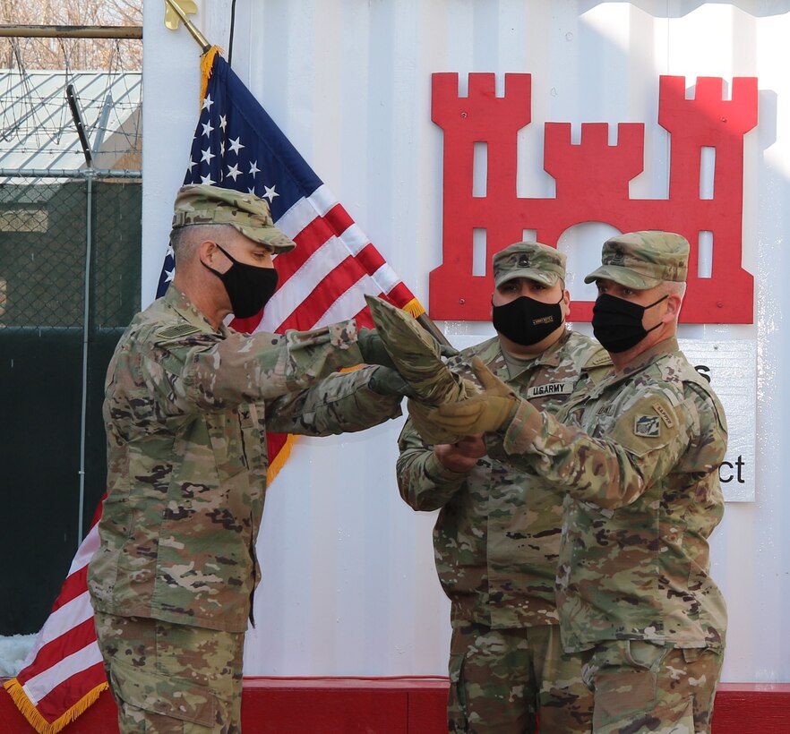 COL Mark Geraldi, USACE Transatlantic Afghanistan District Commander, along with Sergeant First Class Joseph Harrison, and Sergeant Major Nathan Marshall, Senior Enlisted Leader Case the Command Colors at Bagram Airfield, Afghanistan.