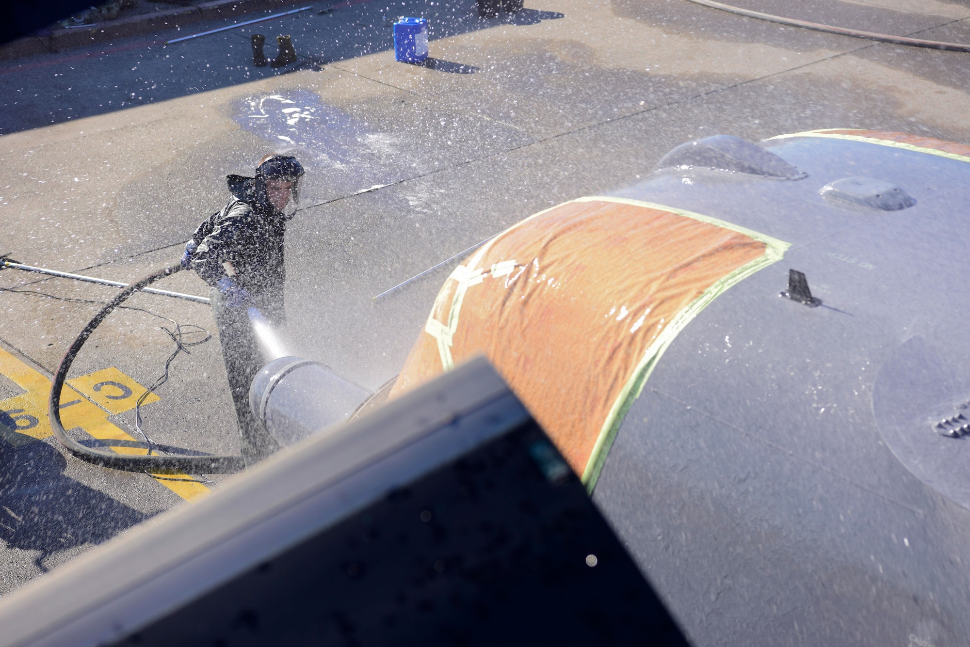 Airman 1st Class Russell Zutell, 753rd Special Operations Aircraft Maintenance Squadron crew chief, cleans the nose of a CV-22 Osprey assigned to the 21st Special Operations Squadron