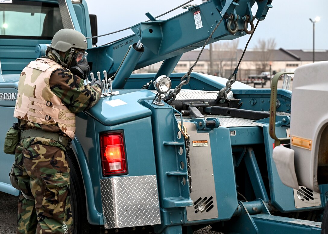 An Airman operates a wrecker.