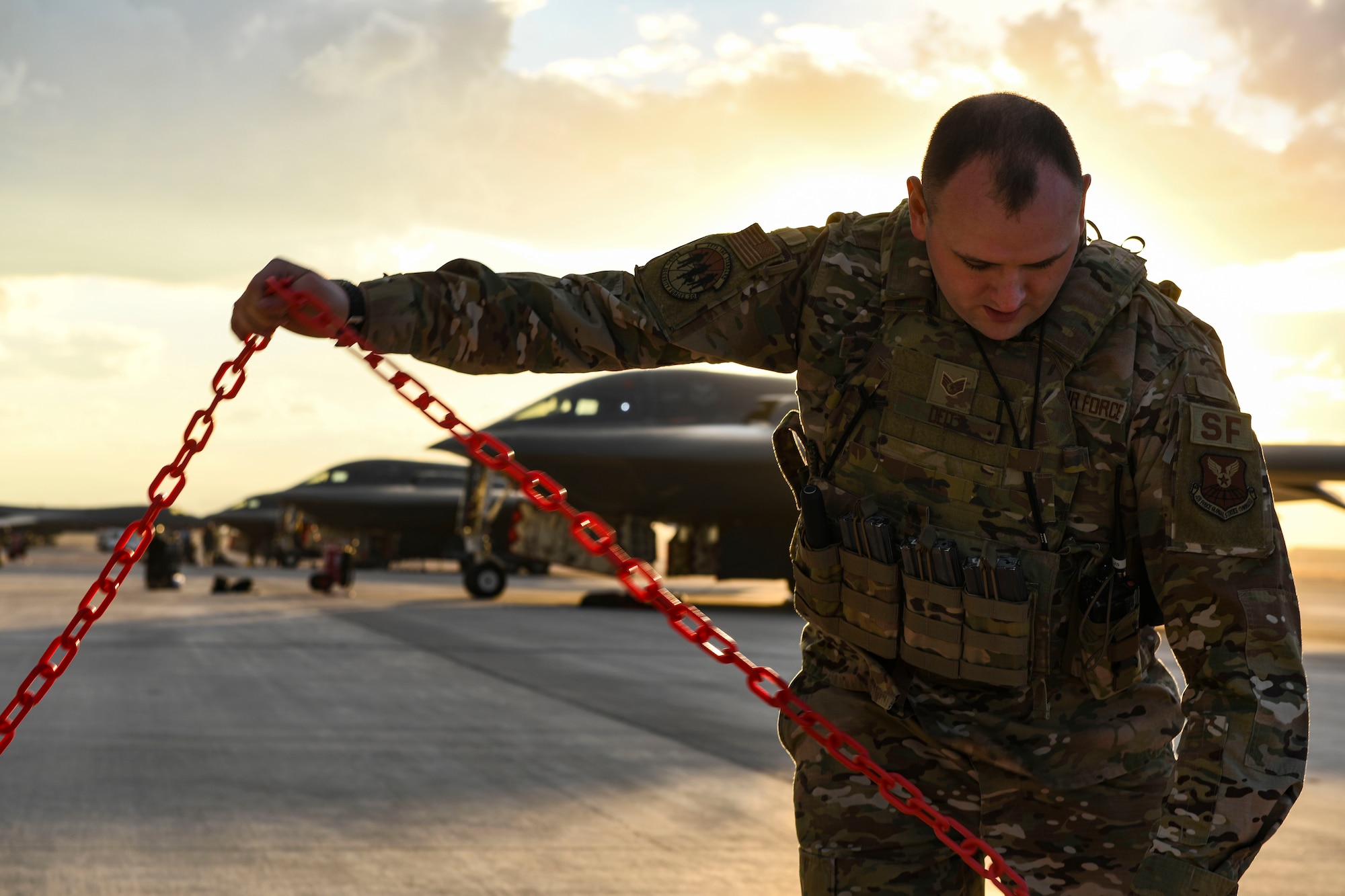 U.S. Air Force Staff Sgt. William Deitt, 509th Security Forces Squadron combat arms instructor, sets up a cordon during Red Flag 21-1, at Nellis Air Force Base, Nevada, Jan. 22, 2021. Along with aircrew, Team Whiteman brought approximately 100 Airmen to participate in the large force exercise and to be the lead wing. As the lead Wing, RF 21-1 enables Team Whiteman to maintain a high state of readiness and proficiency, while validating our always-ready global strike capability. (U.S. Air Force photo by Staff Sgt. Sadie Colbert)