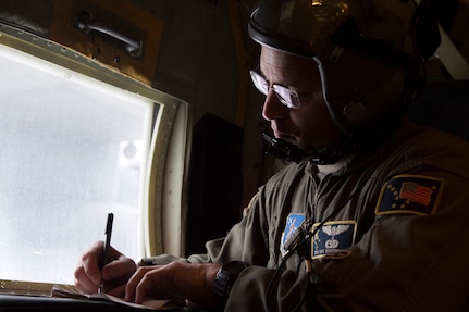 U.S. Air Force Tech. Sgt. Eric Dickerson, a loadmaster assigned to the 211th Rescue Squadron, Alaska Air National Guard, creates a timeline for a HC-130J Combat King II’s simulated search and rescue over Alaska, Jan. 21, 2021, during Operation Noble Defender. Operation Noble Defender is a North American Air Defense Command air-defense operation which allows dynamic training for operational readiness in an arctic environment.