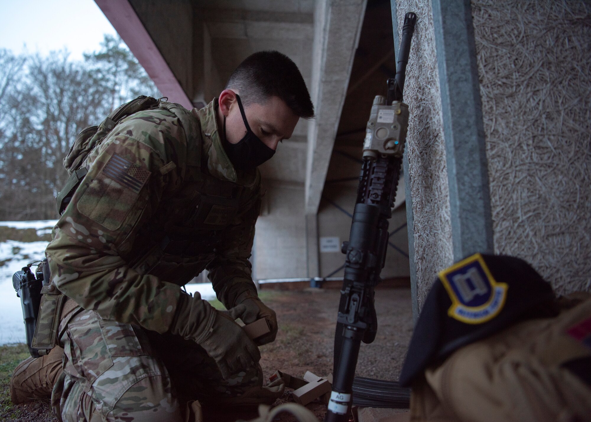 U.S. Air Force Capt. Christopher Gresham, 569th U.S. Forces Police Squadron operations officer, sorts ammunition at Breitenwald Landstuhl Range, Germany, Jan. 20, 2021.