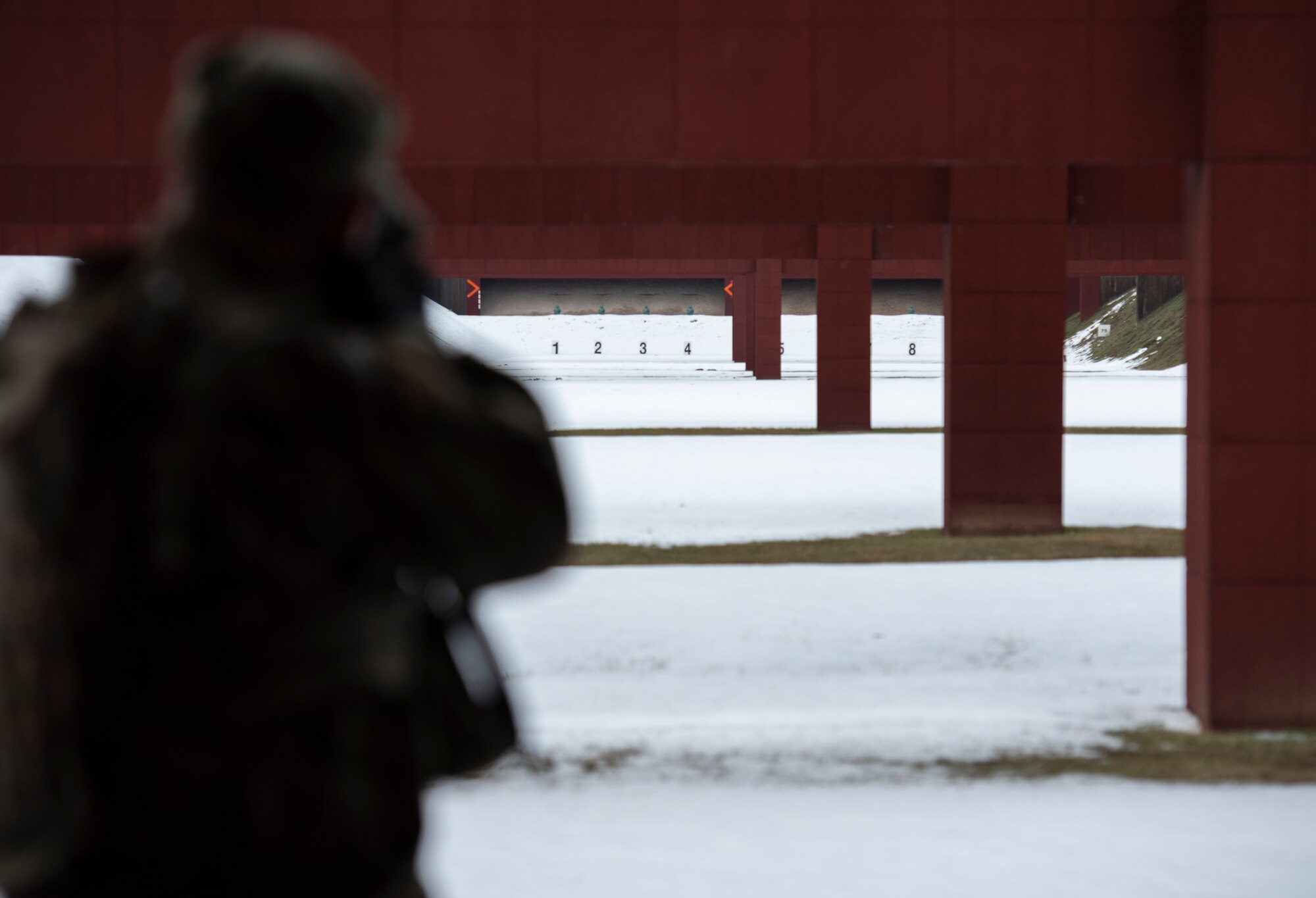U.S. Air Force Master Sgt. Paul Benedict, 569th U.S. Forces Police Squadron logistics and mobility noncommissioned officer in charge, aims at a target at Breitenwald Landstuhl Range, Germany, Jan. 20, 2021.