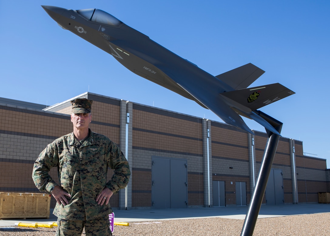 A U.S. Marine stands in front of the new F-35 flight simulator on Marine Corps Air Station Miramar, Calif., Jan. 21.
