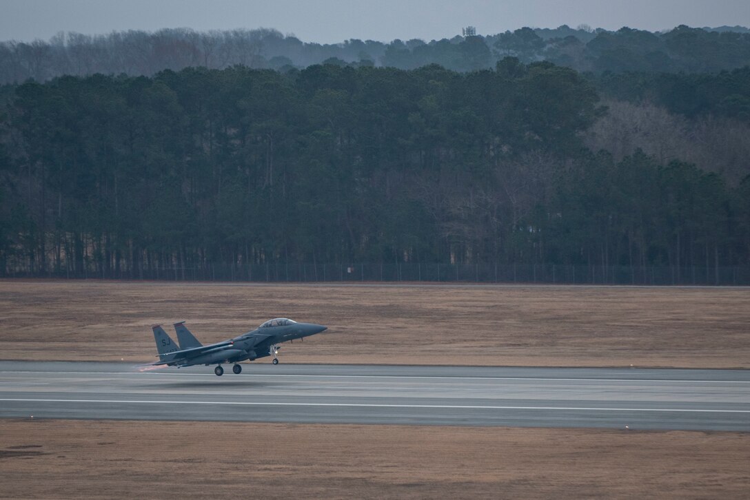 An F-15E Strike Eagle from the 333rd Fighter Squadron takes off at Seymour Johnson Air Force Base, North Carolina, Jan. 14, 2021.