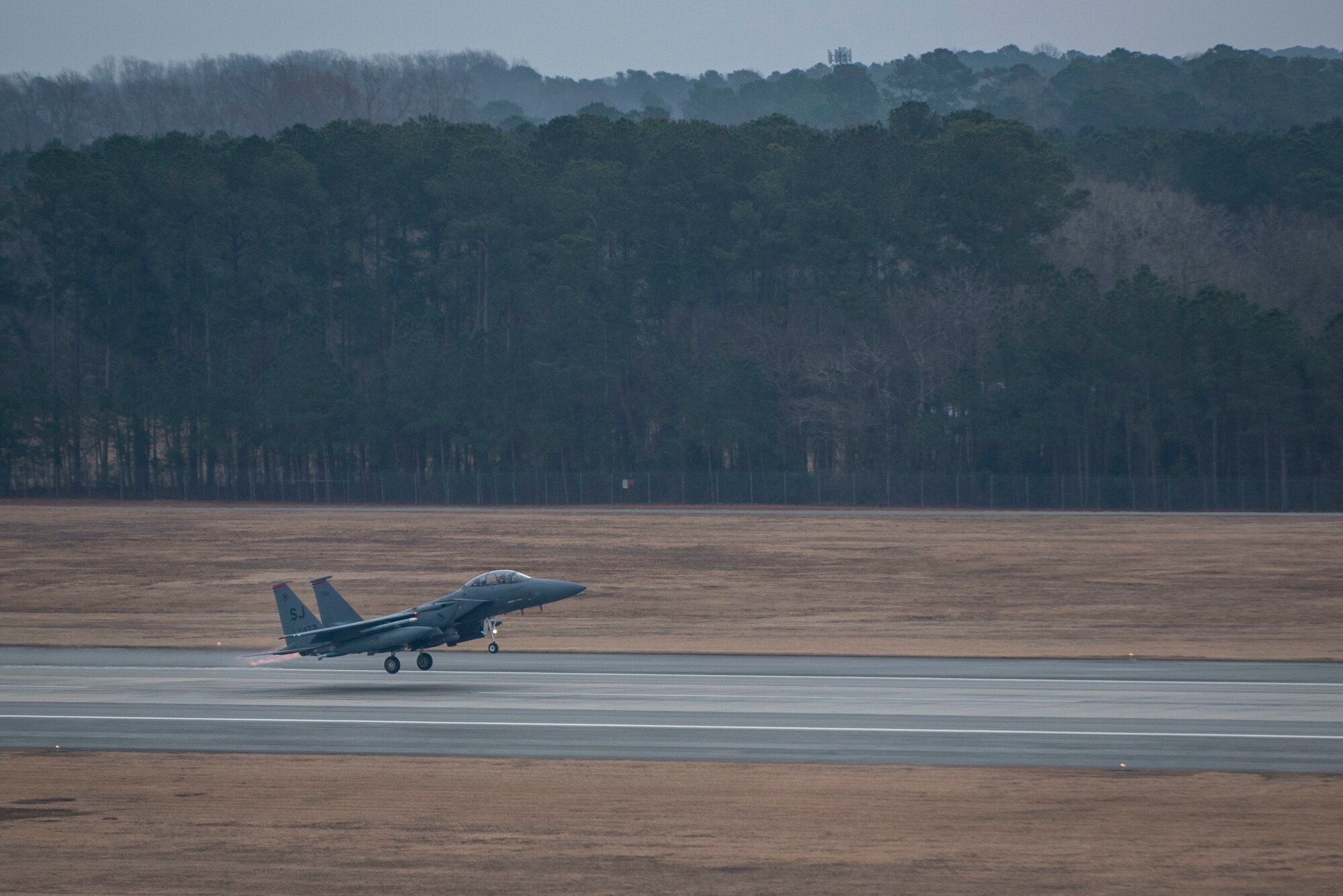 An F-15E Strike Eagle from the 333rd Fighter Squadron takes off at Seymour Johnson Air Force Base, North Carolina, Jan. 14, 2021.