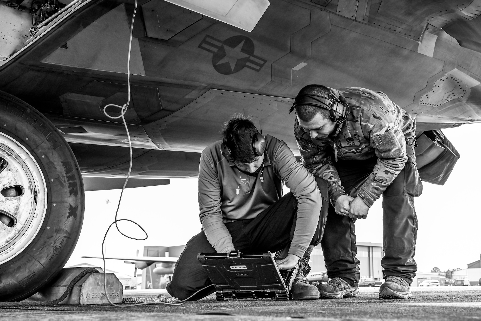 An Airman instructs another Airman during training.