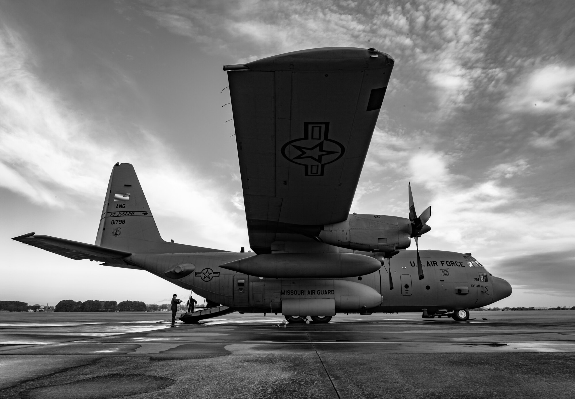 An aircraft sits on the flight line.