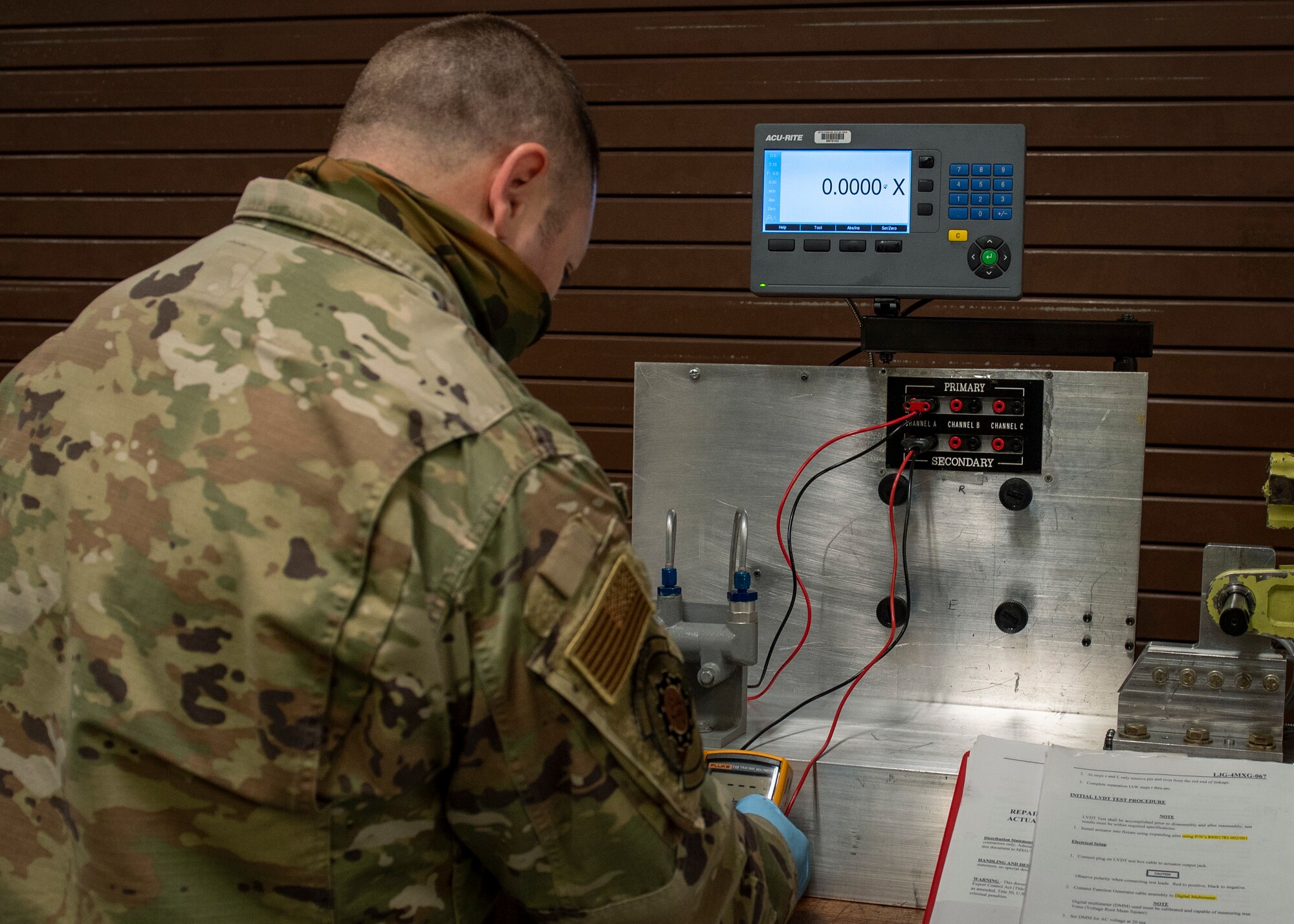 Staff Sgt. Steven Hall, 4th Component Maintenance Squadron centralized repair facility expeditor, calibrates a stabilator actuator test apparatus at Seymour Johnson Air Force Base, North Carolina, Jan. 7, 2021.