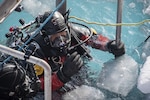 U.S. Coast Guard Petty Officer 1st Class Andres Murtillo enters the water Feb. 1, 2020, during a scuba dive about seven miles north of McMurdo Station, Antarctica. Scuba divers from the U.S. Coast Guard, U.S. Army and the Royal Canadian Navy are serving aboard the U.S. Coast Guard Cutter Polar Star (WAGB-10) in order to effect emergency repairs if needed to the 44-year-old heavy icebreaker. The crew of the Seattle-based Polar Star is working near Antarctica in support of Operation Deep Freeze 2020, the U.S. military’s contribution to the National Science Foundation-managed U.S. Antarctic Program. U.S. Coast Guard photograph by Senior Chief Petty Officer NyxoLyno Cangemi