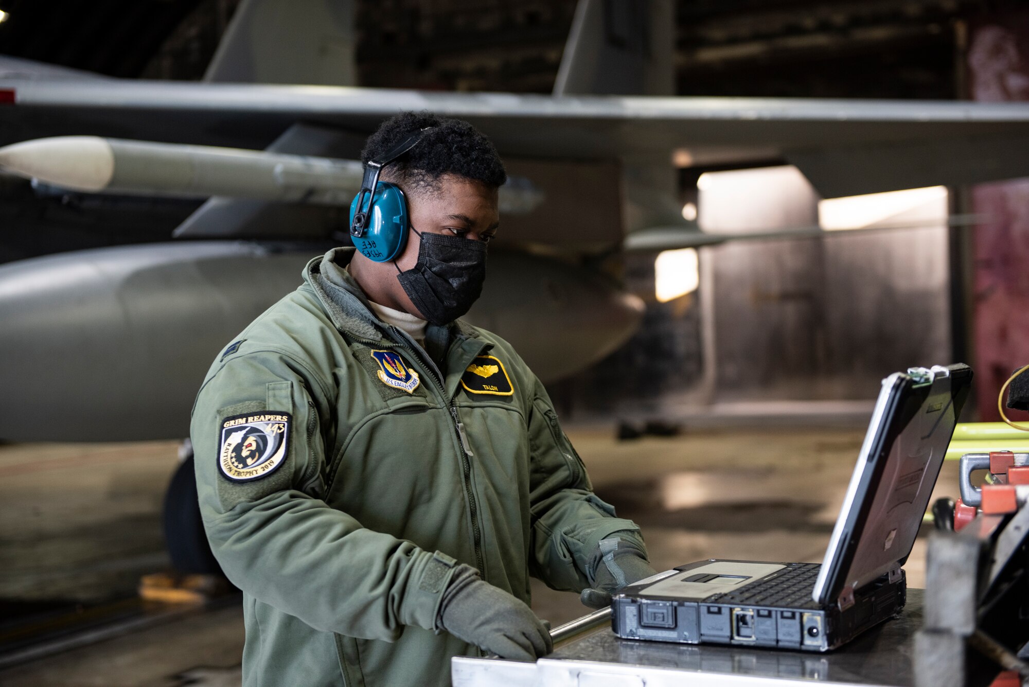 U.S. Air Force Capt. Joshua Jones, 493rd Fighter Squadron F-15C Eagle pilot, assists with pre-flight checks at Royal Air Force Lakenheath, England, Jan. 21, 2021. Aircrew and other Airmen and Aircrew from non-maintenance career fields recently had the opportunity to practice Agile Combat Employment concepts while helping generate sorties for the 493rd FS. (U.S. Air Force photo by Airman 1st Class Jessi Monte)