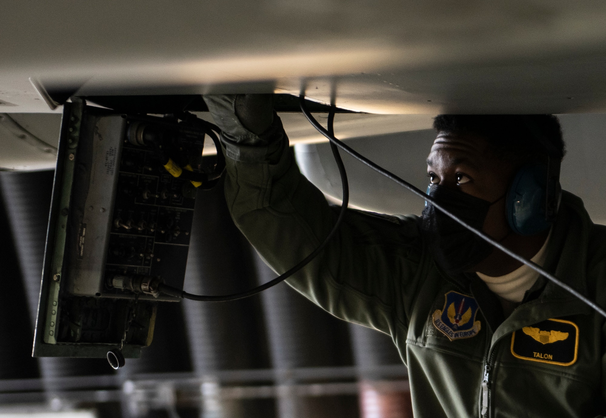 U.S. Air Force Capt. Joshua Jones, 493rd Fighter Squadron F-15C Eagle pilot, removes the communications cable from an aircraft prior to take-off at Royal Air Force Lakenheath, England, Jan. 21, 2021. The 48th Fighter Wing is dedicated to developing a force of multi-capable Airmen to drive the mission more effectively through the integration of Agile Combat Employment concepts. (U.S. Air Force photo by Airman 1st Class Jessi Monte)