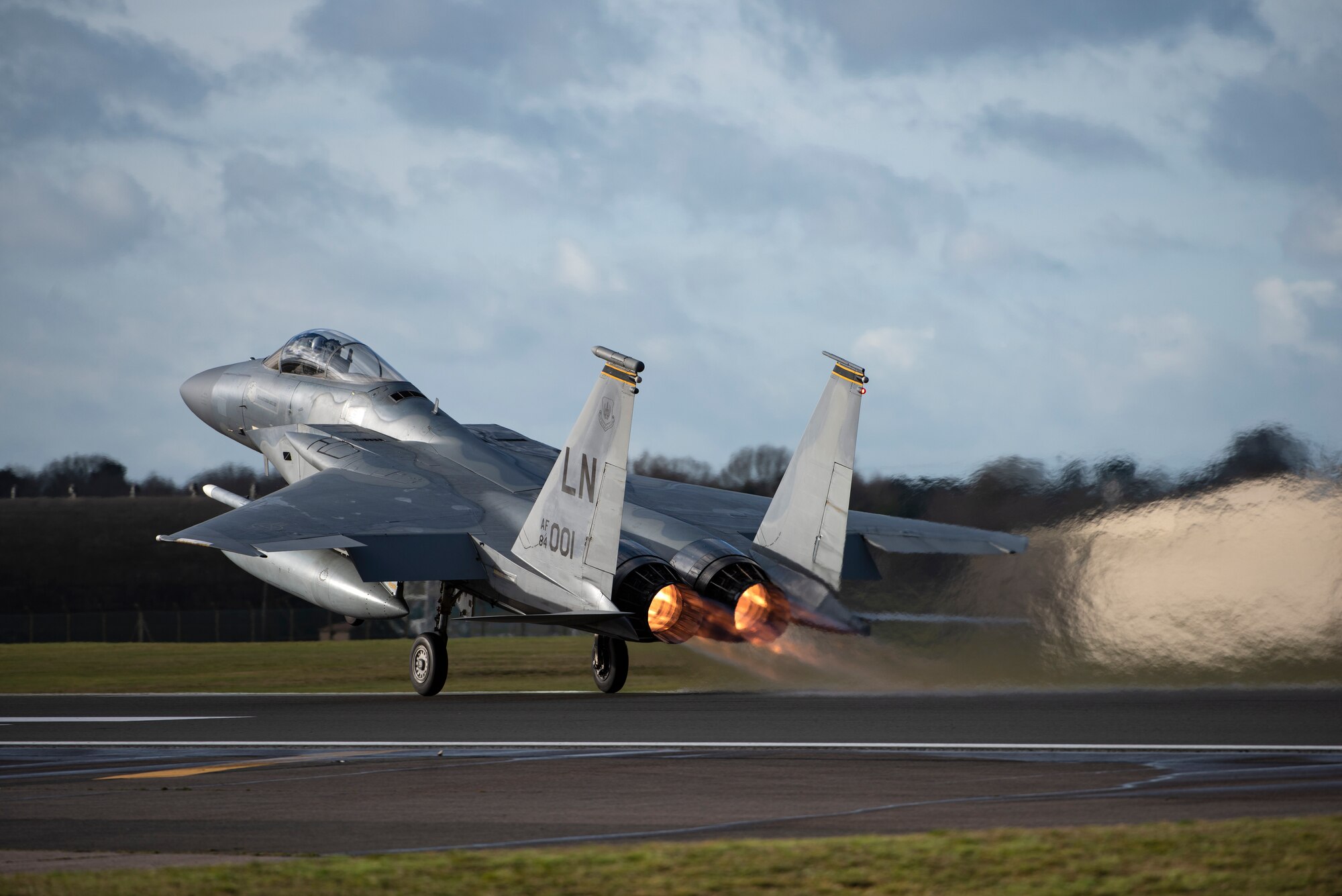 An F-15C Eagle assigned to the 493rd Fighter Squadron takes off at Royal Air Force Lakenheath, England, Jan. 21, 2021. Aircrew and other Airmen and Aircrew from non-maintenance career fields recently had the opportunity to practice Agile Combat Employment concepts while helping generate sorties for the 493rd FS. (U.S. Air Force photo by Airman 1st Class Jessi Monte)