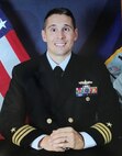 Studio portrait of Cmdr. Matthew T. Erdner.