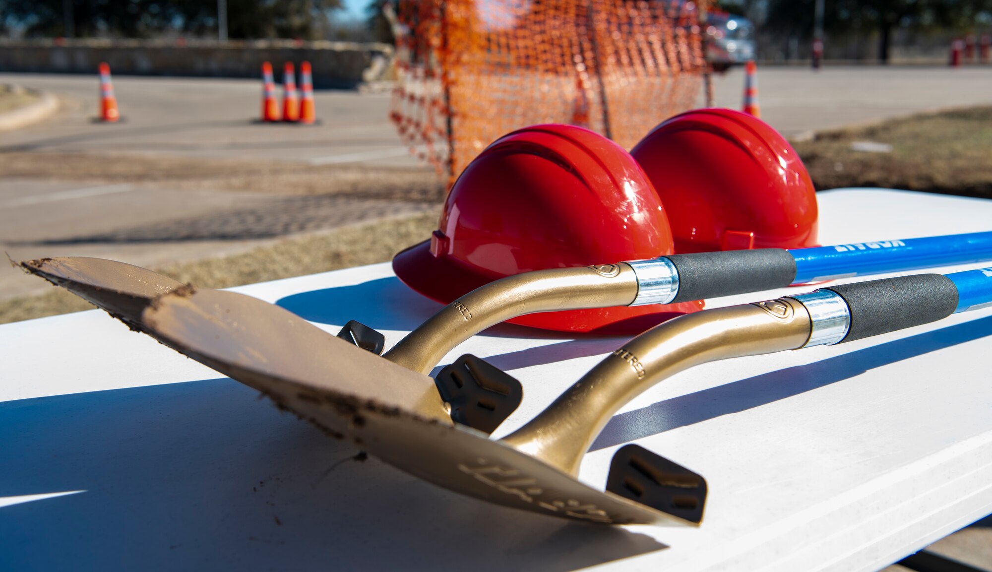 Hardhats and golden shovels were used by the 7th Bomb Wing commander and Abilene Mayor during the Visitor Control Center’s groundbreaking ceremony at Dyess Air Force Base, Texas, Jan. 25, 2021.