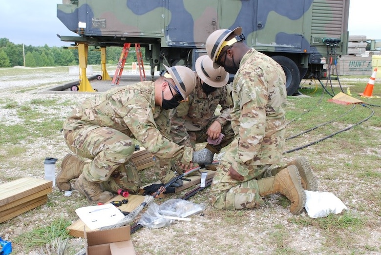 Students from the U.S. Army Prime Power School repair a spliced electrical cable during one of many electrical outage scenarios incorporated in the Prime Power Capstone Training Exercise at the Contingency Basing Integration Training and Evaluation Center (CBITEC) in Fort Leonard Wood, Mo., Aug. 11, 2020. Prime Power School students are tested at the CBITEC on the knowledge, skills and abilities they gained over the year-long course to become prime power specialists. CBITEC is a U.S. Army Engineer Research and Development Center, Construction Engineering Research Laboratory facility that supports the operational energy continuum and safely trains the warfighter to tackle the nation’s power challenges.