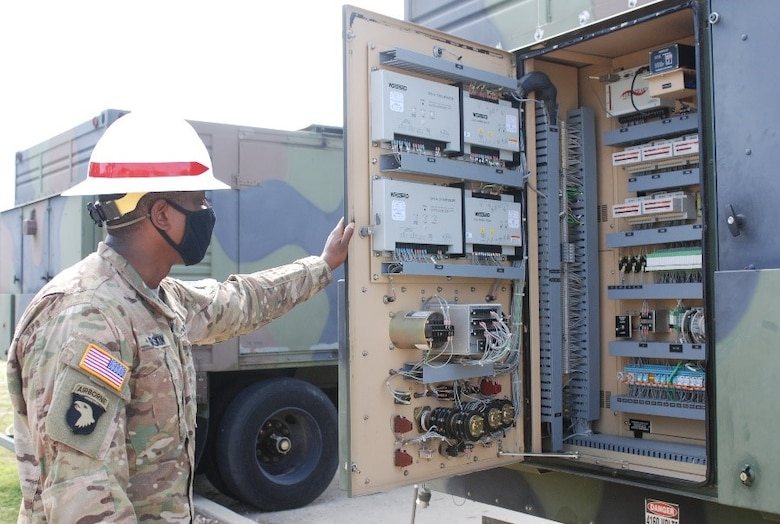 Staff Sgt. Russell Gaskin, U.S. Army Prime Power School instructor, reviews an electrical panel during the Prime Power Capstone Training Exercise at the Contingency Basing Integration Training and Evaluation Center (CBITEC) in Fort Leonard Wood, Mo., Aug. 11, 2020. Prime Power School students are tested at the CBITEC on the knowledge, skills and abilities they gained over the year-long course to become prime power specialists. CBITEC is a U.S. Army Engineer Research and Development Center, Construction Engineering Research Laboratory facility that supports the operational energy continuum and safely trains the warfighter to tackle the nation’s power challenges.