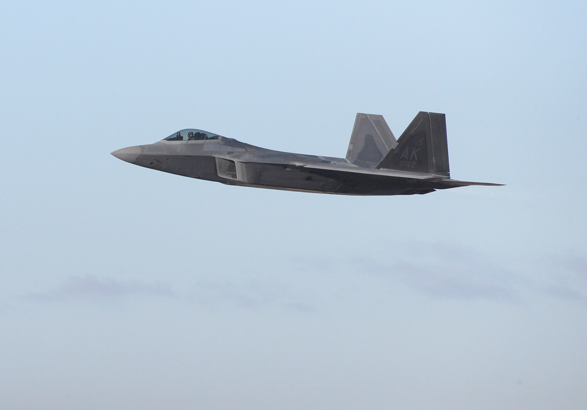 Maj. Philip “Stonewall” Johnson, 514th Flight Test Squadron F-22 test pilot, departs Hill Air Force Base, Utah, Nov. 24, 2020, on a functional check flight in the last F-22 Raptor to complete the F-22 Structural Repair Program. The 574th Aircraft Maintenance Squadron processed 135 F-22s through the program by performing structural modifications to increase total flying hour serviceability on each aircraft by 8,000 hours. (U.S. Air Force photo by Alex R. Lloyd)