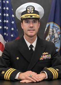 Studio portrait of Cmdr. Jason W. DeBlock