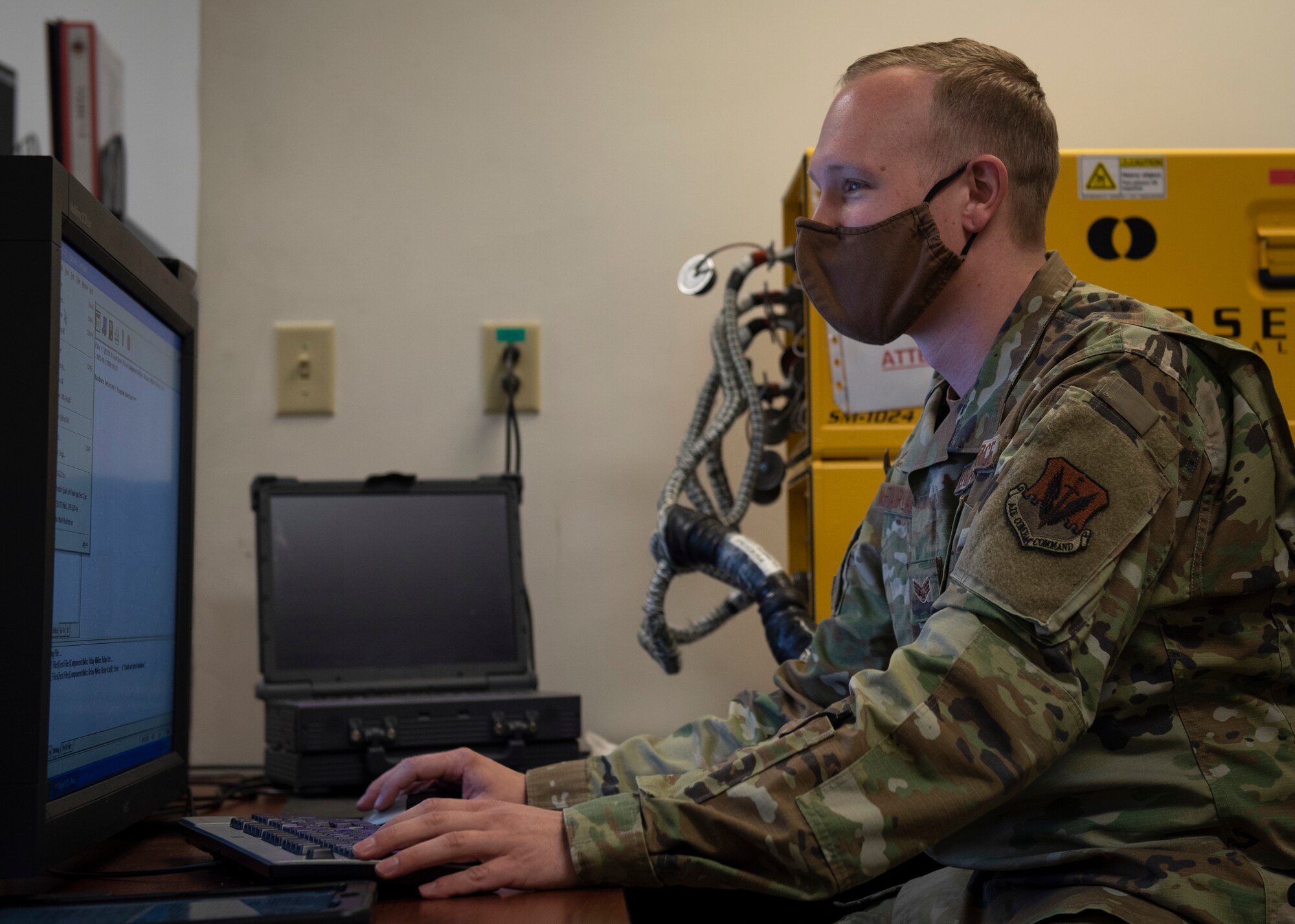 Senior Airman Alex McFarland, 4th Component Maintenance Squadron electrical and environmental specialist, works on an eclipse test set at Seymour Johnson Air Force Base, North Carolina, Jan. 12, 2021.