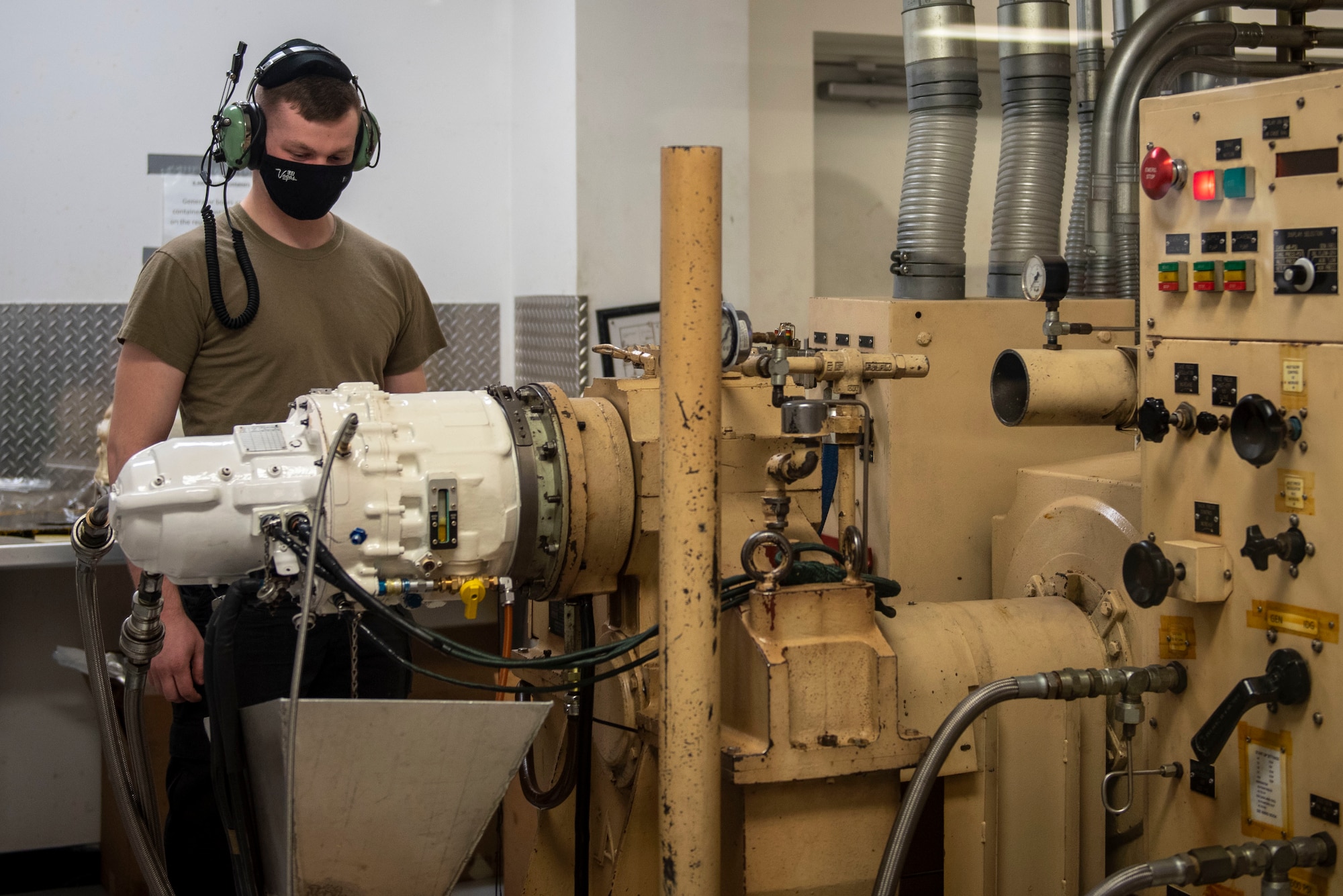 Senior Airman Samuel Blankenship, 4th Component Maintenance Squadron electrical and environmental specialist, uses a K400 stand to assemble and test an integrated drive generator at Seymour Johnson Air Force Base, North Carolina, Jan. 13, 2021.