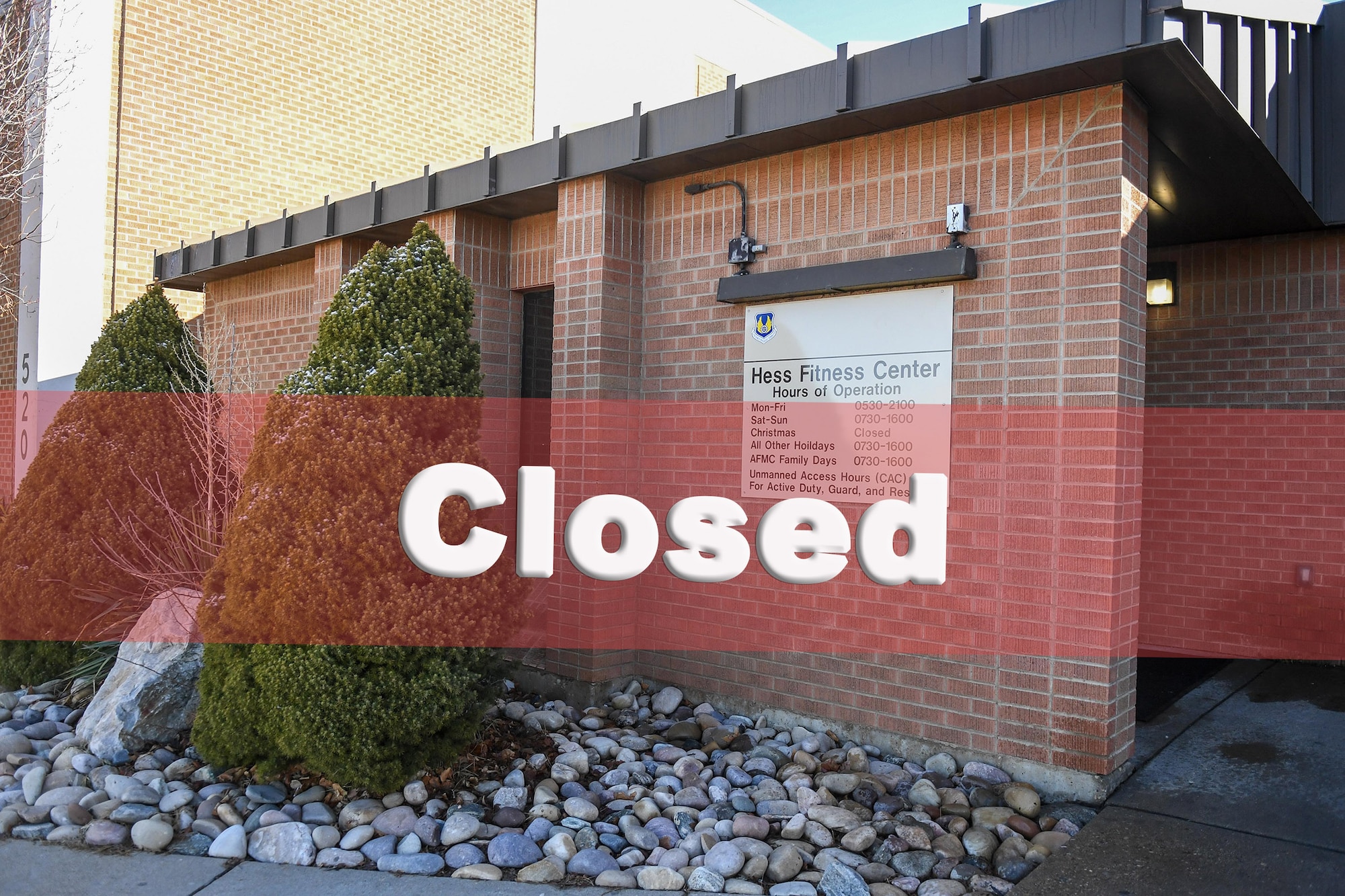 Photo of Hess Fitness Center with red banner that says closed.