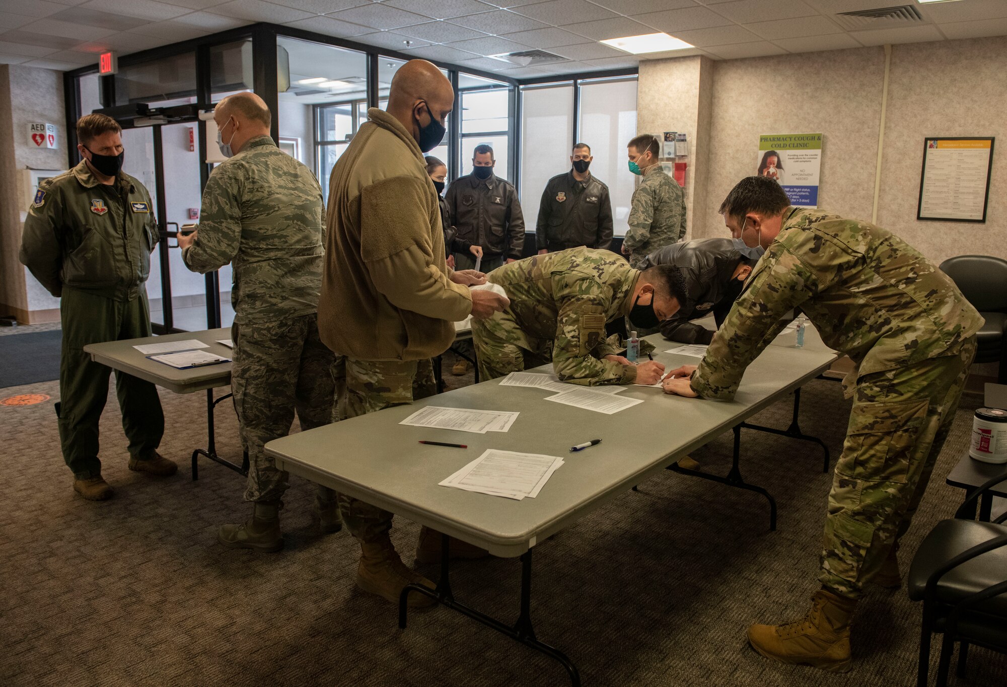 Grand Forks airmen register to receive the COVID-19 vaccine at Grand Forks Air Force Base, N.D., Jan. 22, 2021. Within 30 hours of receiving the shipment, all doses at the 319th Medical Group had been either administered or allocated to base personnel.