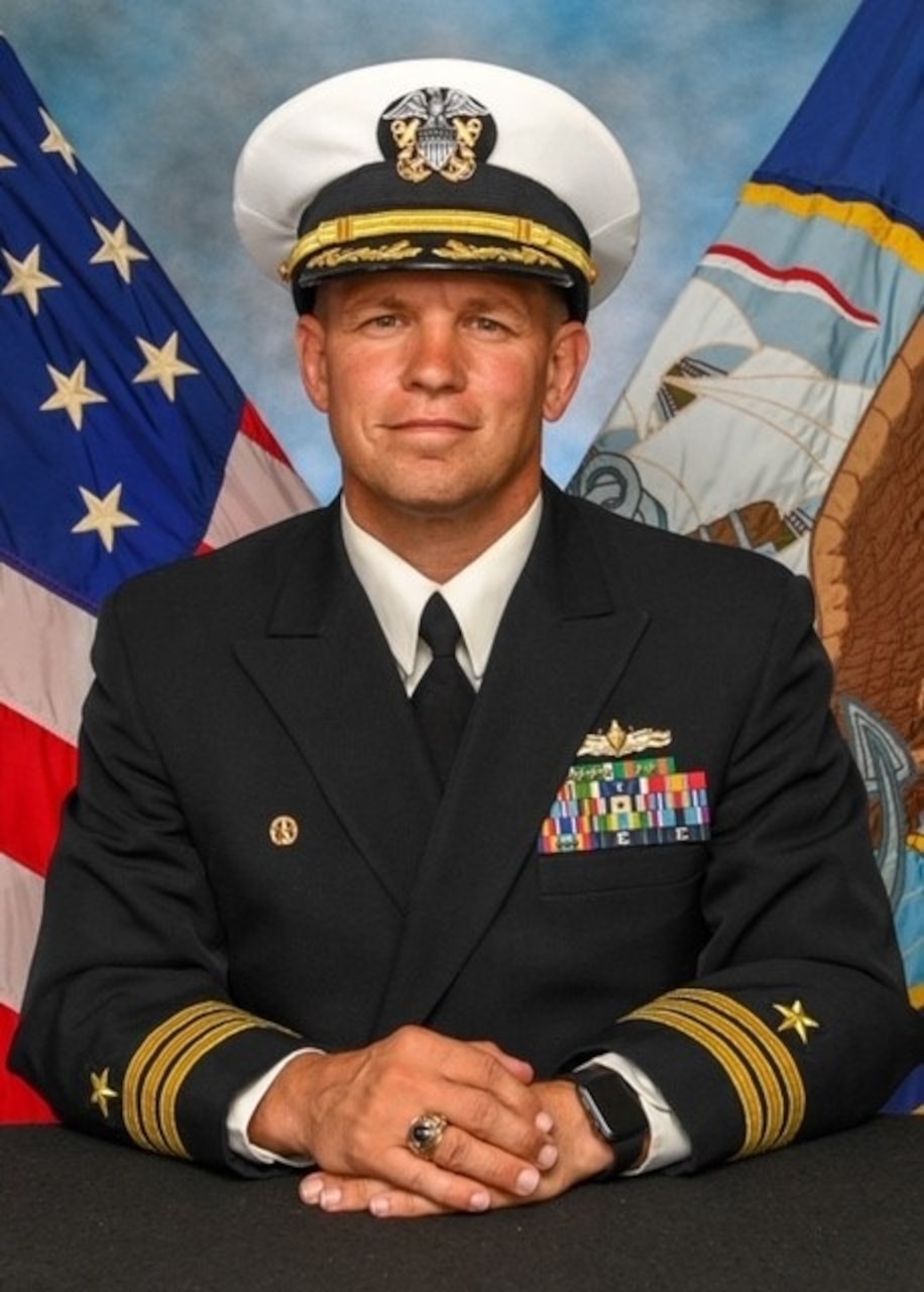 Commander Dustin T. Lonero