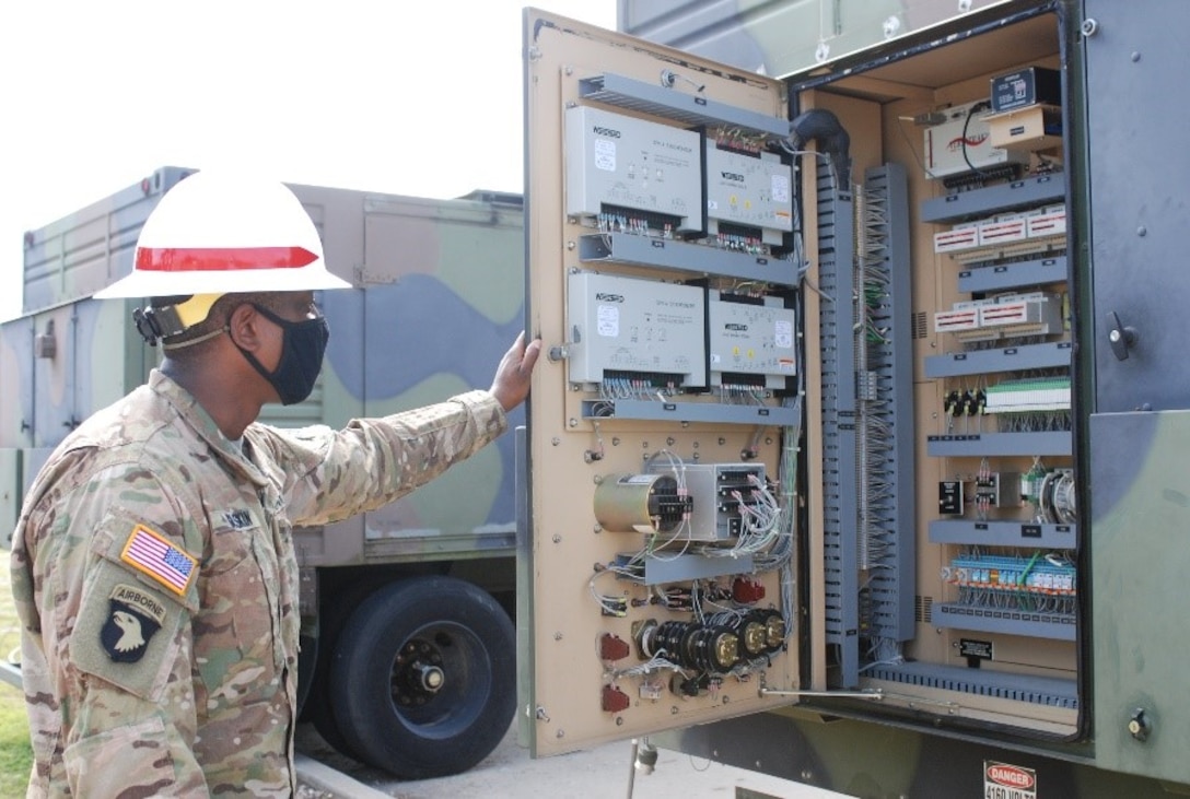 Staff Sgt. Russell Gaskin, U.S. Army Prime Power School instructor, reviews an electrical panel during the Prime Power Capstone Training Exercise at the Contingency Basing Integration Training and Evaluation Center (CBITEC) in Fort Leonard Wood, Mo., Aug. 11, 2020. Prime Power School students are tested at the CBITEC on the knowledge, skills and abilities they gained over the year-long course to become prime power specialists. CBITEC is a U.S. Army Engineer Research and Development Center, Construction Engineering Research Laboratory facility that supports the operational energy continuum and safely trains the warfighter to tackle the nation’s power challenges.