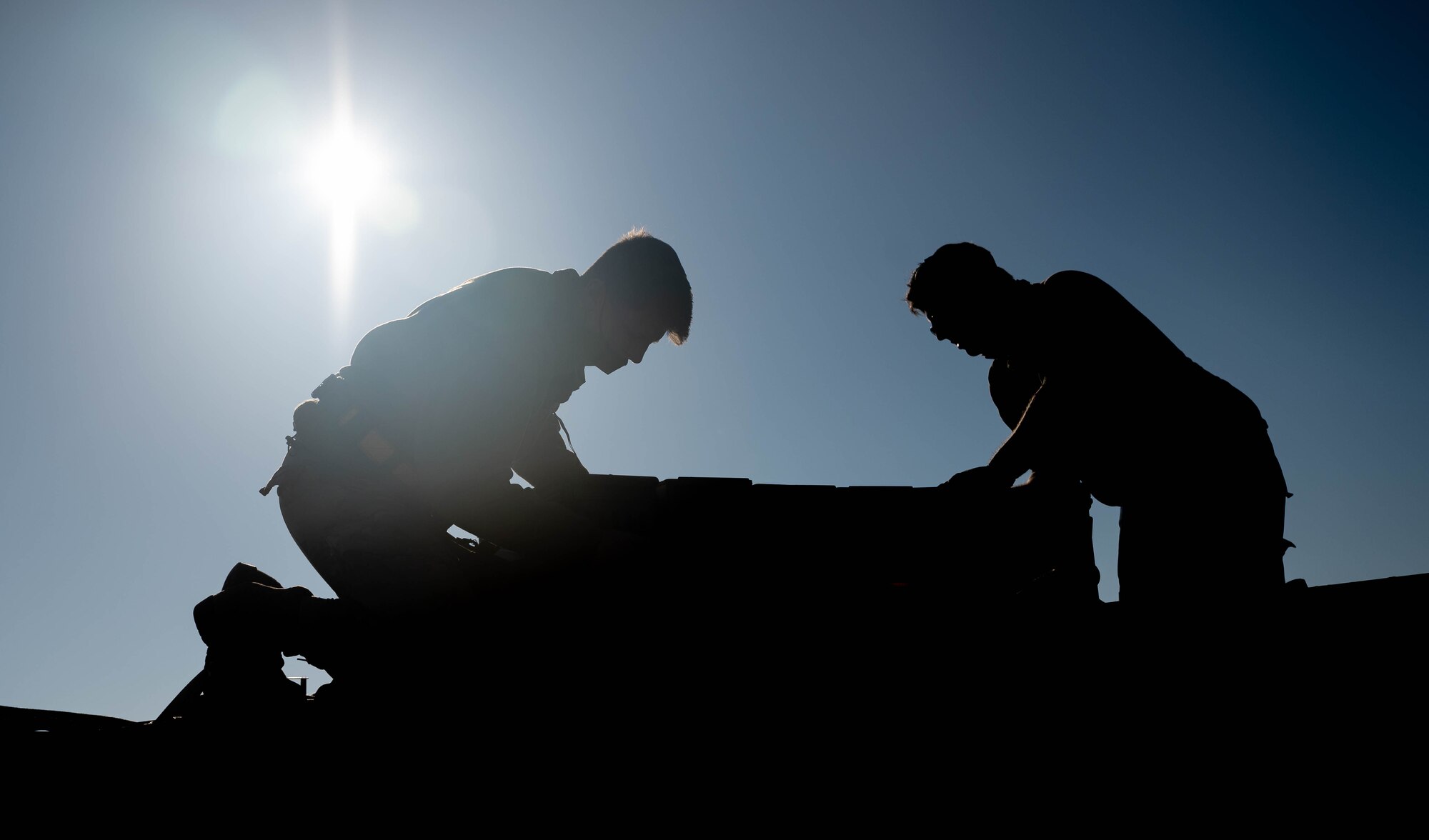 Airmen prepare cargo for an exercise.