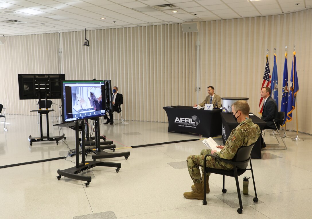 To create the virtual event, a studio-like setting was created for the awards ceremony. From left to right are Mr. Timothy Sakulich, Dr. Jonathan Spowart, Mr. Keith Slinker and Col. Michael Warner.