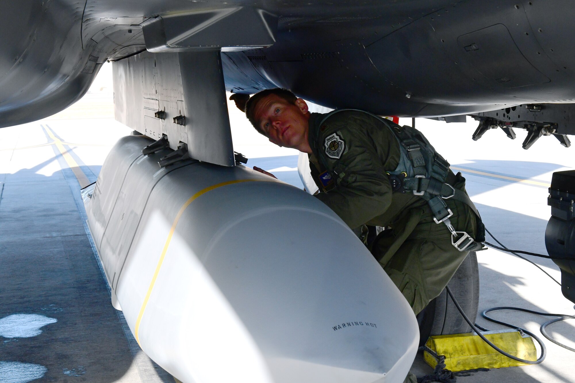 Maj. Ryan Mobley, 706th Fighter Squadron assistant director of operations and F-15E test director, prepares to conduct an AGM-158B Joint Air-to-Surface Standoff Missile drop from an F-15E, Jan. 7, Nellis Air Force Base, Nev. While the F-15E is the leading delivery platform for JASSM in the Area of Responsibility, the missile release at White Sands Missile Range, New Mexico, was the first JASSM dropped by any unit from Nellis AFB.
