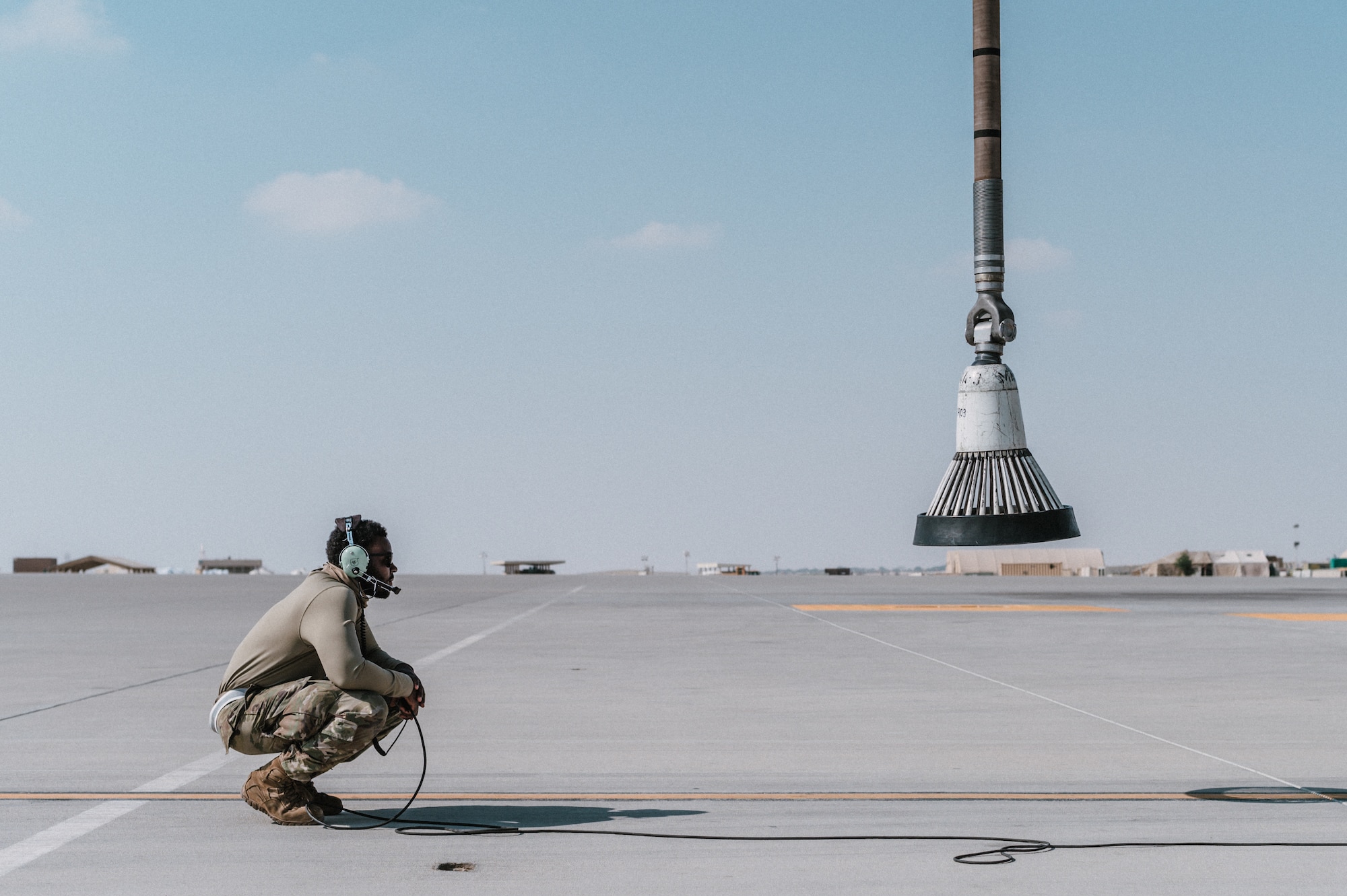 man looks at refueler drudge