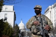 Sgt. Kaherdin Charles, a cavalry scout with Troop B, 2nd Squadron, 104th Cavalry Regiment, Pennsylvania National Guard, patrols near the Capitol in Washington, D.C., on Jan. 14, 2021.