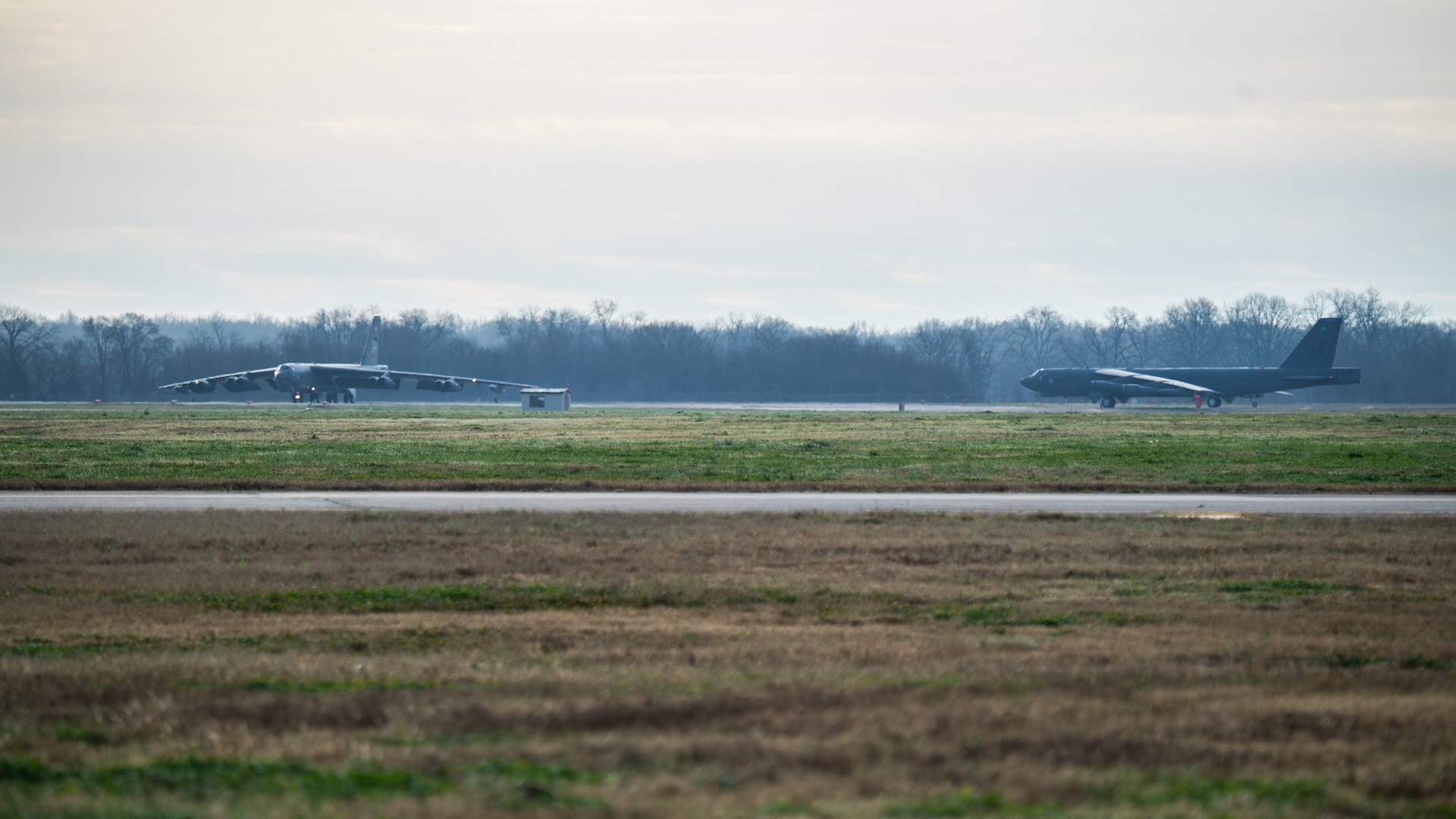 U.S. Air Force B-52 Stratofortress' take off from Barksdale Air Force Base, LA, during a bomber task force mission over the U.S. Central Command area of responsibility, Jan. 26, 2021. The bomber deployment underscores the U.S. Military's commitment to regional security and demonstrates a unique ability to rapidly deploy on short notice. The B-52 is a long-range, heavy bomber that is capable of flying at high subsonic speeds of altitudes of up to 50,000 feet and provides the United States with a global strike capability.(U.S. Air Force photo by  Airman 1st Class Jacob B. Wrightsman)