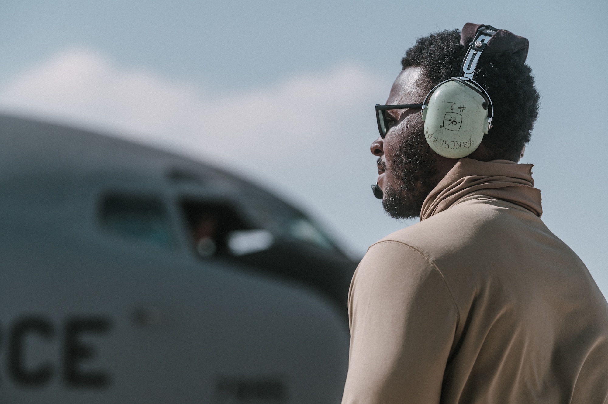 man observes KC-135