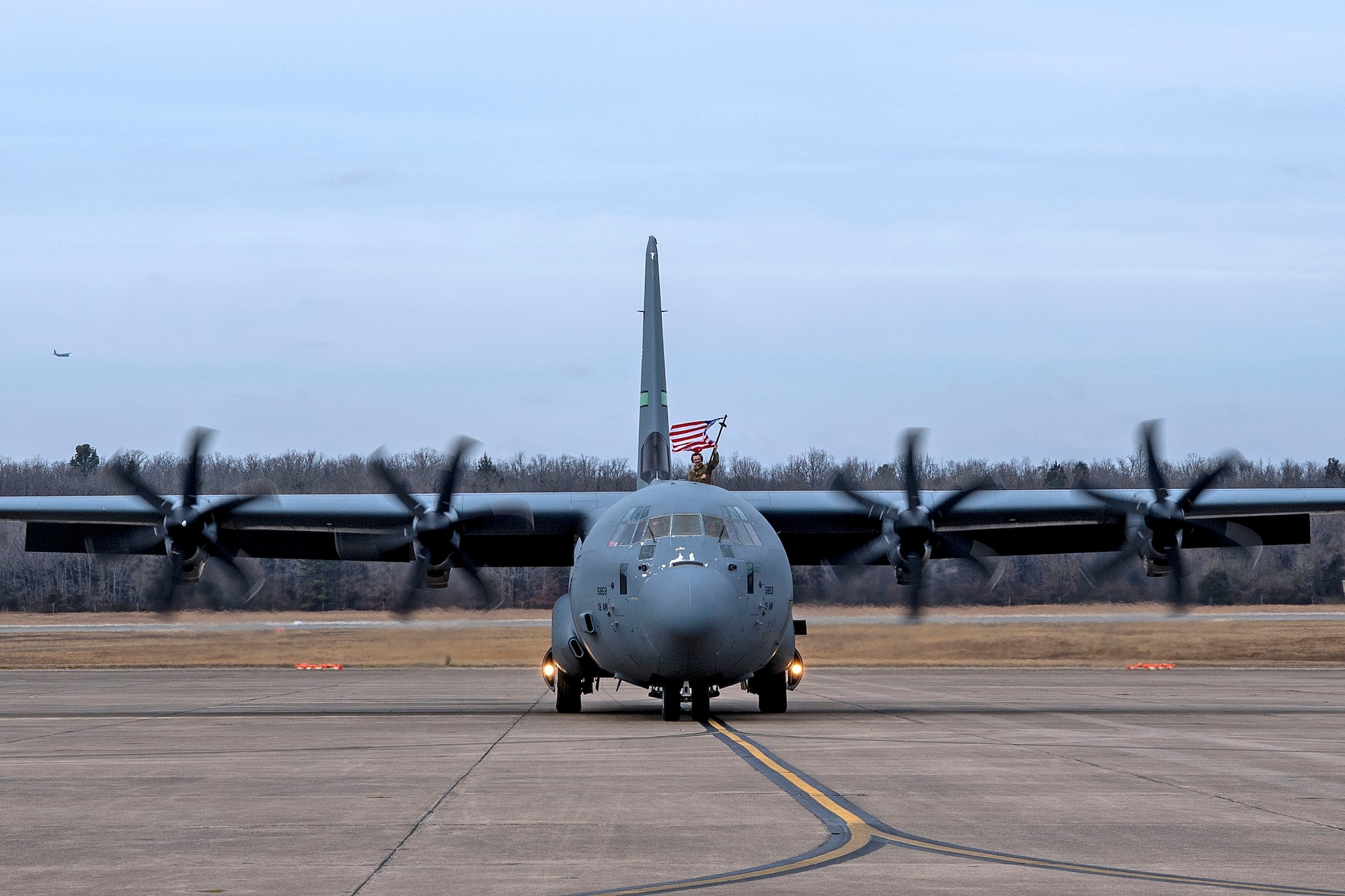 An aircraft taxis on the flightline