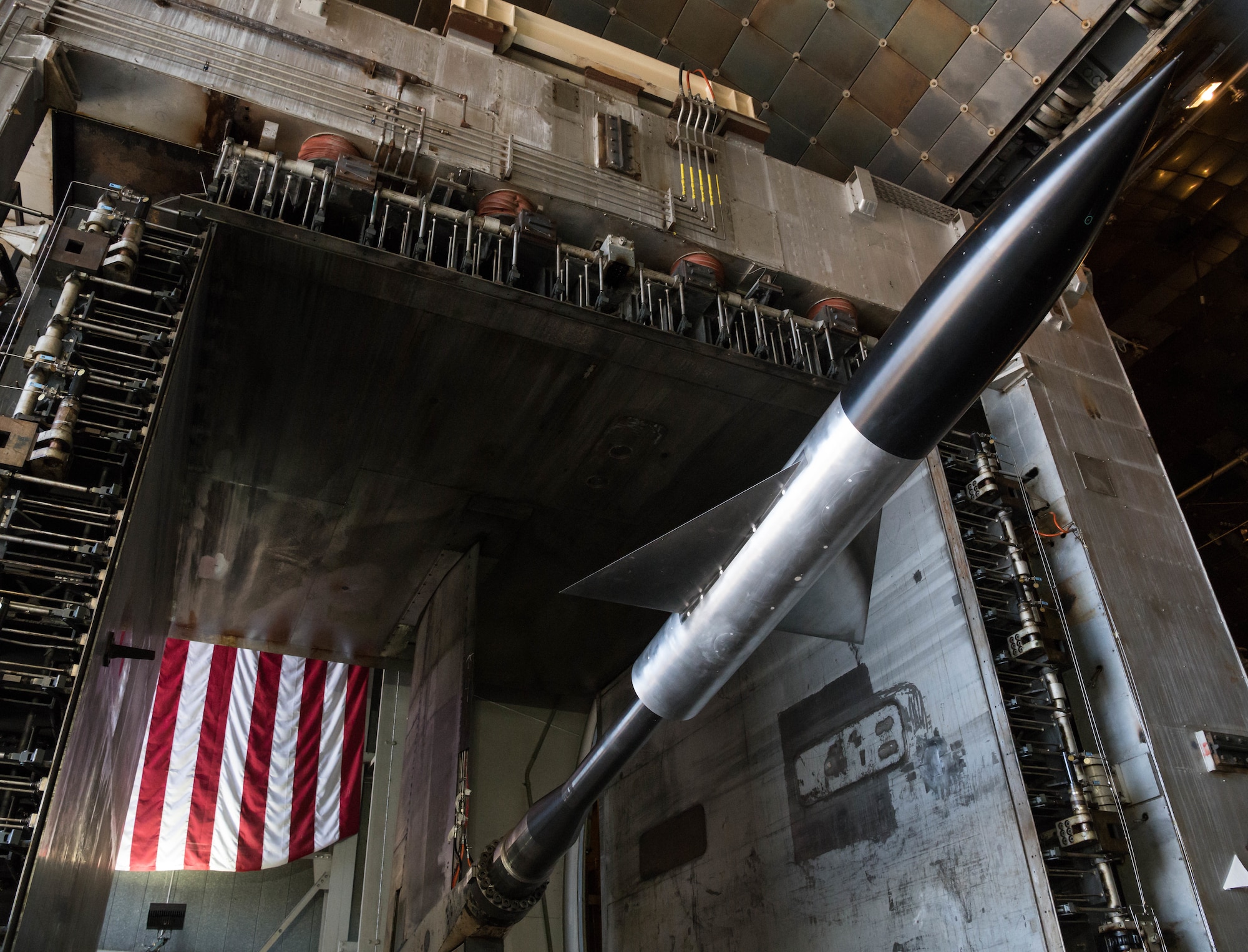 A test cart with an AGARD-B model installed is moved into the 16-foot supersonic wind tunnel, Jan. 12, 2021, at Arnold Air Force Base, Tenn. The test run with the AGARD-B model is the culmination of years of work to return Tunnel 16S to service. (U.S. Air Force photo by Jill Pickett)