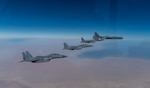 A U.S. Air Force B-52 Stratofortress  from the 2nd Bomb Wing, Barksdale Air Force Base, LA, flew with Royal Saudi Arabian Air Force F-15SAs during a bomber task force mission over the U.S. Central Command area of responsibility, Jan. 27, 2021. The bomber deployment underscores the U.S. Military's commitment to regional security and demonstrates a unique ability to rapidly deploy on short notice. The B-52 is a long-range, heavy bomber that is capable of flying at high subsonic speeds of altitudes of up to 50,000 feet and provides the United States with a global strike capability.