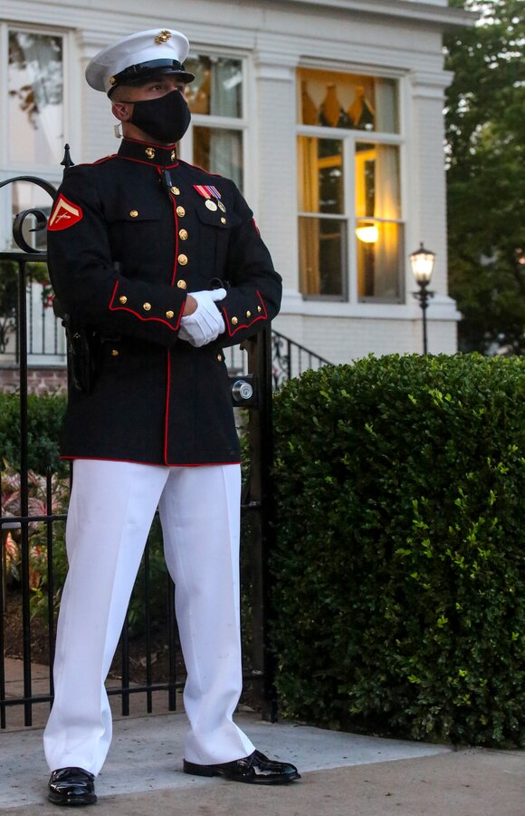 A Marine with Guard Company, Marine Barracks Washington, D.C., stands his post outside of the Home of the Commandants during a full dress rehearsal in preparation for the upcoming Friday Evening Parades at the Oldest Post of the Corps, Washington, D.C., June 24, 2020. This year’s parades will look a little different than those of the past. With the ongoing Covid-19 health concerns, the Barracks will be conducting these ceremonies in small capacities while adhering to Center for Disease Control (CDC) and Department of Defense’s (DoD) guidelines.(U.S. Marine Corps photo by Sgt. Robert Knapp/Released)